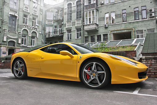 April 29, 2014; Kiev, Ukraine; Yellow supercar Ferrari 458 Italia in the city