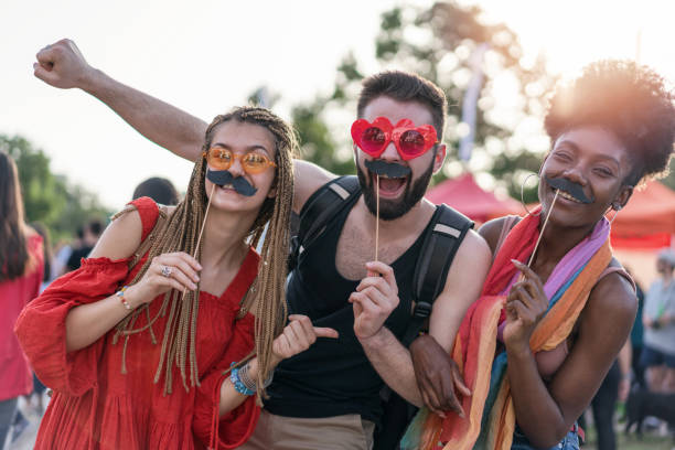 istock Excited young people partying at the love pride parade 1205354859