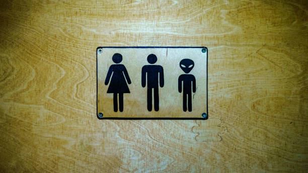istock Gender neutral sign for the restroom. Inclusive concept. Space for text. 1205355332