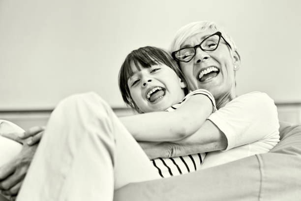 Grandmother with her granddaughter smiling