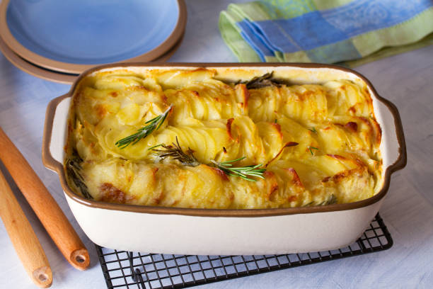 istock Potato gratin (with cream and butter). Scalloped potatoes or potato bake. 1205362758