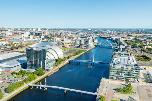 Wide angle aerial view of the River Clyde and landmarks, Glasgow, Scotland, UK Wide angle view of the Finnieston Crane and SSE Hydro arena, Clyde Arc on the banks of the River Clyde. Glasgow, Scotland, UK, Europe. glasgow scotland stock pictures, royalty-free photos & images