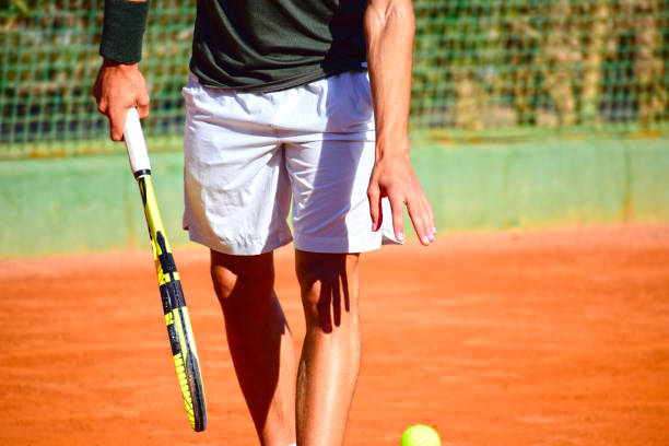 istock Professional tennis player about to serve. 1205363530