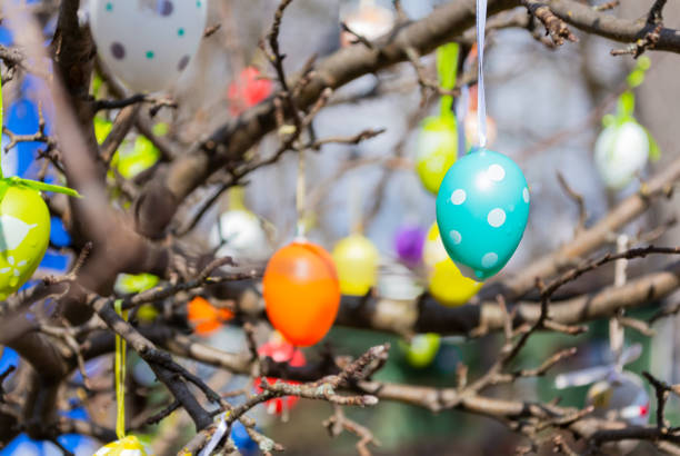 Easter eggs on a fountain in the city.
