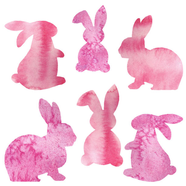 istock Multi-colored cute fluffy Easter bunnies in the picturesque stains. 1205364339