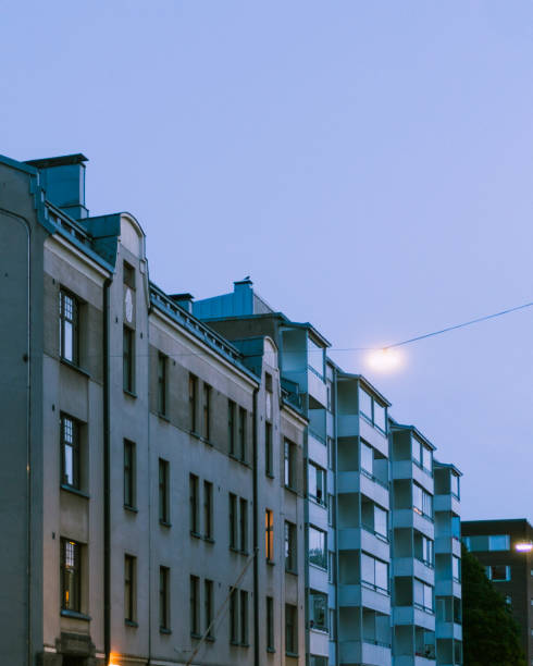 istock Apartment buildings against night sky 1205365814