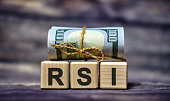RSI - Relative Strength Index acronym concept on cubes