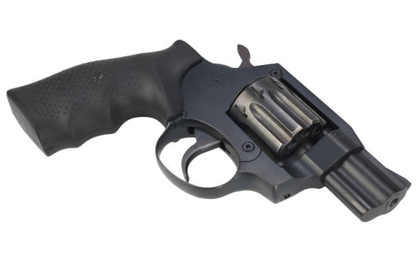 istock Revolver gun isolated on white background 1205369347