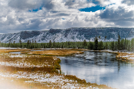 On a cloudy and cold winter day, the beauty of Yellowstone National Park is on full display.