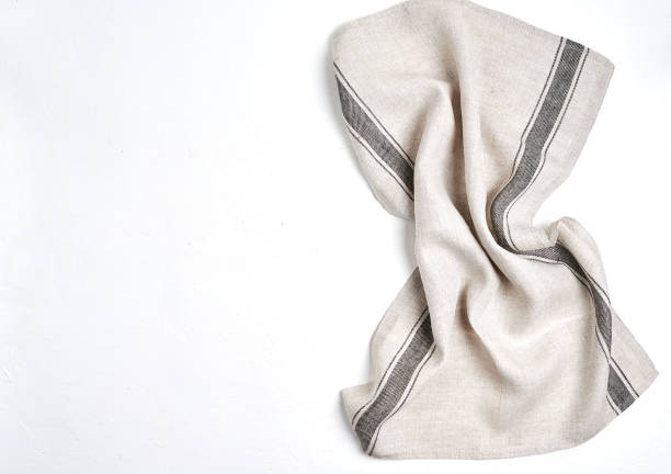 istock kitchen cloth napkin on white background with copy space 1205373071