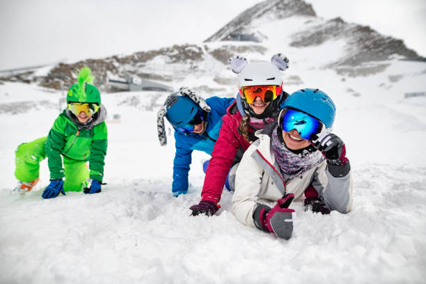 Two young adults living healthy lifestyle exercising during cold weather on snow