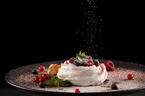 istock Meringue dessert with cream, berries and powdered sugar 1205376747