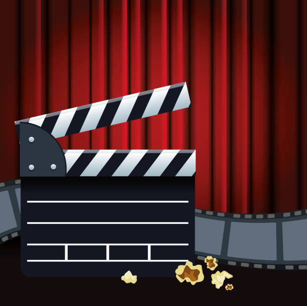 istock movie clapboard and film reel, colorful design 1205377381