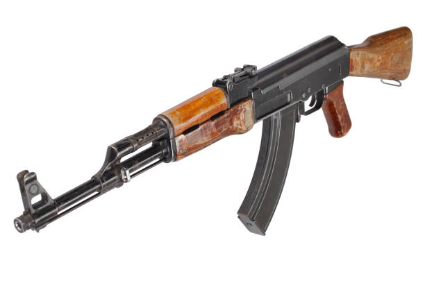 istock Rare first model AK - 47 assault rifle isolated on white 1205379155