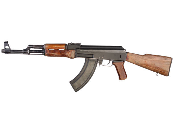 istock Rare first model AK - 47 assault rifle isolated on white 1205379181