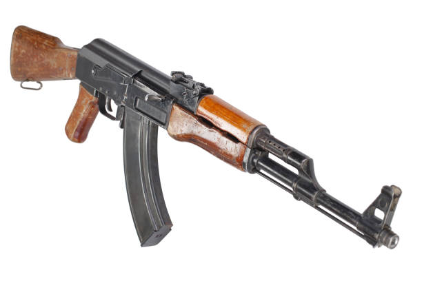istock Rare first model AK - 47 assault rifle isolated on white 1205379195