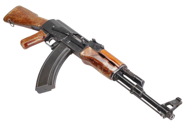 istock Rare first model AK - 47 assault rifle isolated on white 1205379218