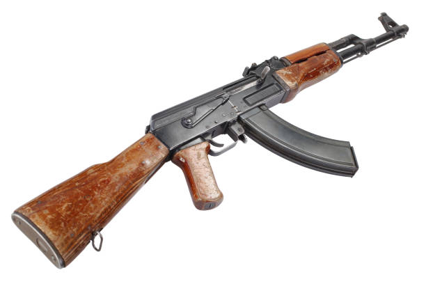Rare first model AK - 47 assault rifle isolated on white Rare first model AK - 47 assault rifle isolated on white ak 47 violence industry black stock pictures, royalty-free photos & images