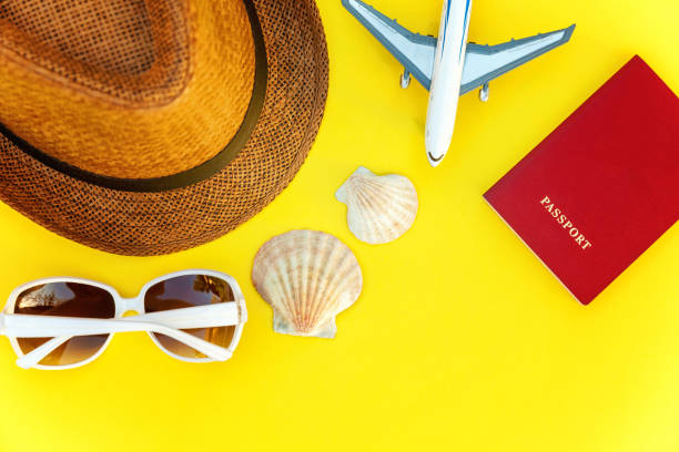 istock Concept of traveling on yellow background 1205384077