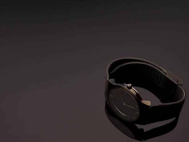 istock Black ladies luxury watch with metal strap mesh on a table gray gradient background 1205387750