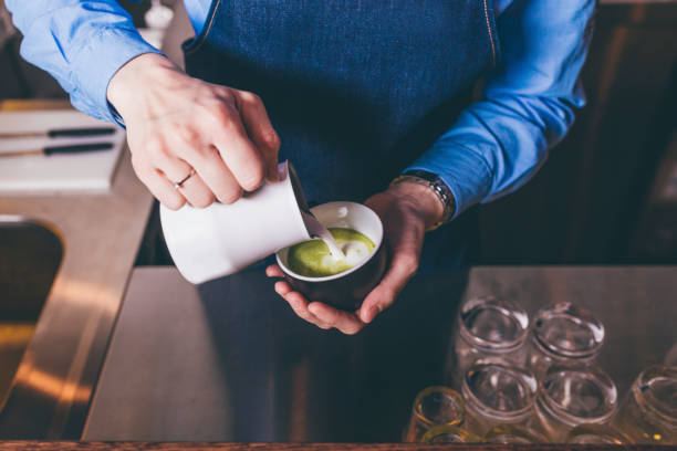 Barista making cappuccino, cafe late art