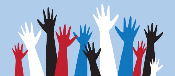 istock Group of colorful multicultural protesters or activists hands in the air 1205394243