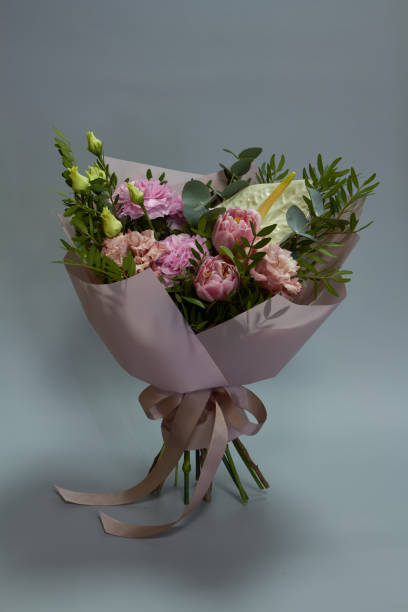 istock Beautiful bridal bouquet in vintage style, light gray background, selective focus 1205403105