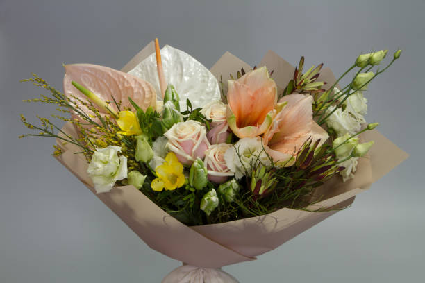 istock Beautiful summer bouquet in pink colors, gray backdrop, selective focus 1205403134