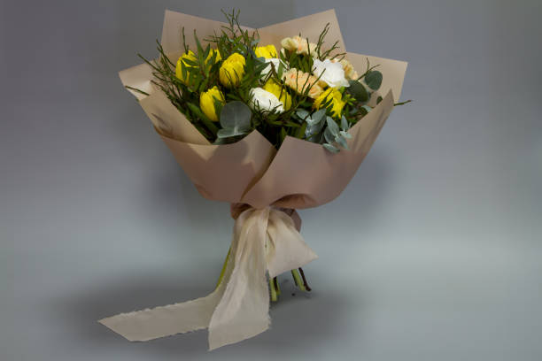 istock Beautiful bouquet in vintage style, light gray background, selective focus 1205403137
