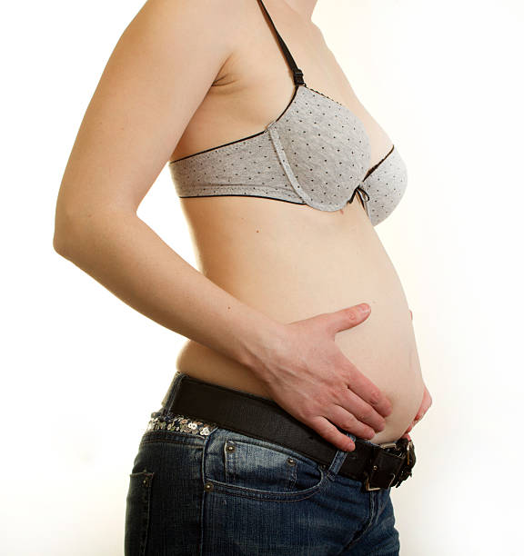 istock Woman holding her big belly 120540501