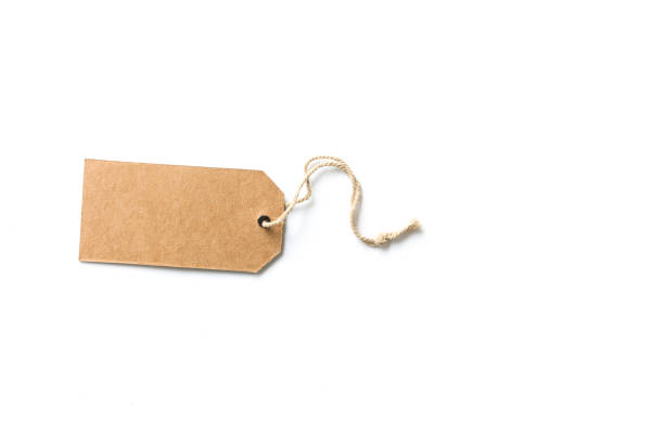 istock Blank price tag isolated on white background.Blank brown cardboard 1205407749