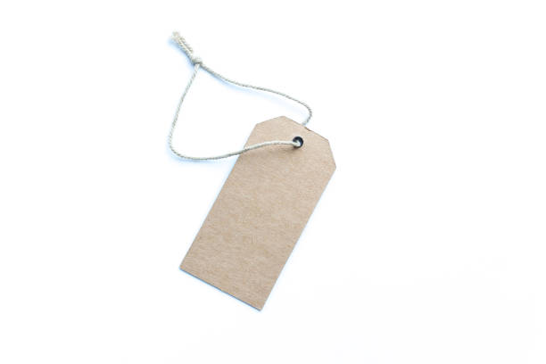 istock Blank brown price tag isolated white background. 1205409717
