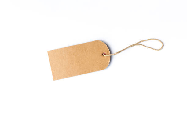 istock brown price tag or label with thread isolated white background. 1205410262