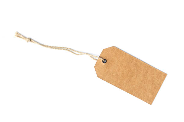 istock Blank brown cardboard price tag or label isolated on white background. 1205410266