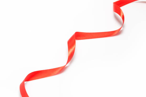 istock Red ribbon on a white background 1205411495
