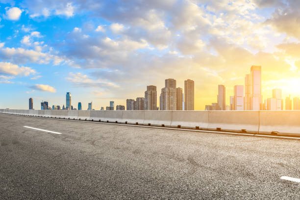 istock Chongqing city skyline and empty asphalt road at dusk 1205412119