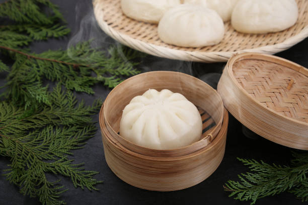 istock Steamed bun with minced pork filling 1205414094