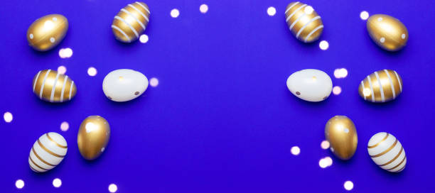 istock Happy Easter eggs blue background. Golden shine decorated eggs in basket, for greeting card, promotion, poster 1205419726