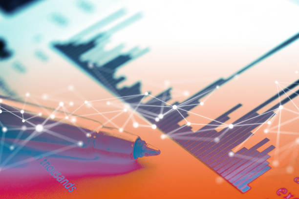 istock Close-up of a Pen and Network Graphic on Financial Report Graph Chart 1205422784