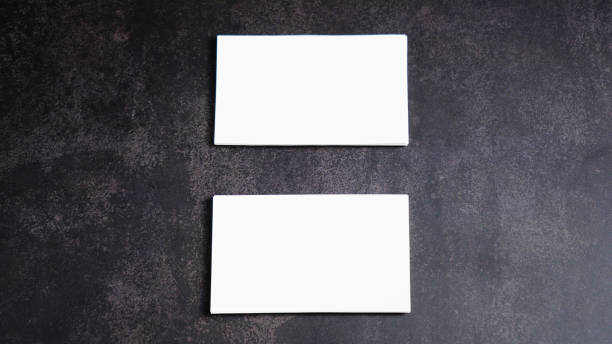istock Mockup white business card on black background. 1205423071