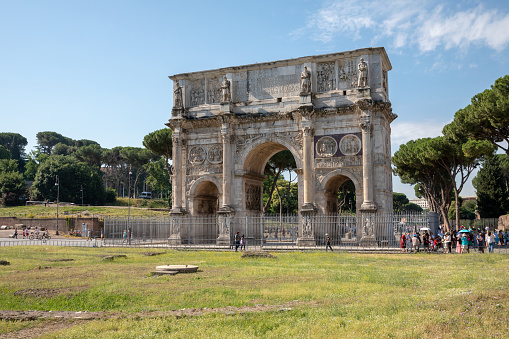 Rome, Italy - June 20, 2018: Triumphal Arch of Constantine in Rome, situated between the Colosseum and the Palatine Hill