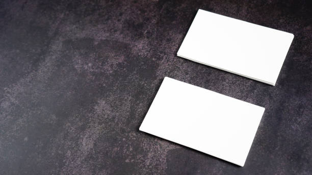 istock Mockup white business card on black background. 1205425152