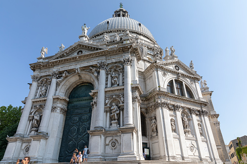 Venice, Italy - July 1, 2018: Panoramic view of Basilica di Santa Maria della Salute (Saint Mary of Healt), known as Salute, is a Roman Catholic church and minor basilica located at Punta della Dogana