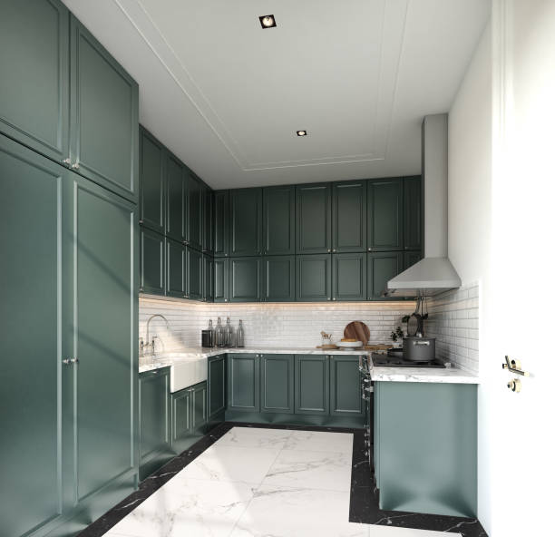 istock Stylish fully kitchen in modern classic style midnight green spray painted cabinet and white brick tiles install on the wall with marble floor tile / interior design 1205428322