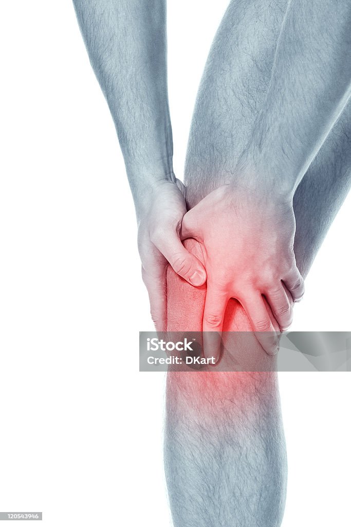 Person illustrated with knee pain from sports injury young sportsman has clasped hands a sick knee to reduce a pain. public health services concept Shock Stock Photo