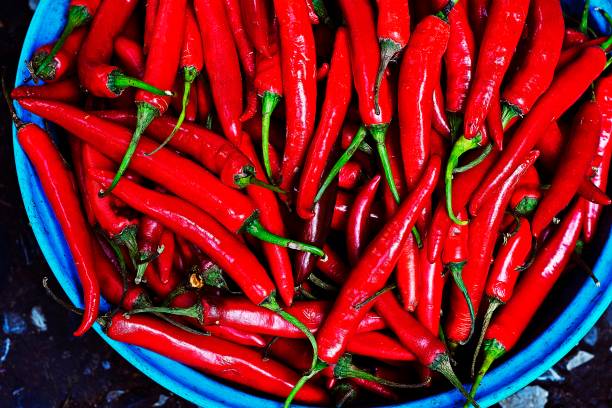 istock Closed up red chili in blue basket. 1205446129