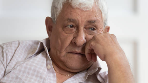 istock Sad senior man look in distance feeling lonely 1205448281