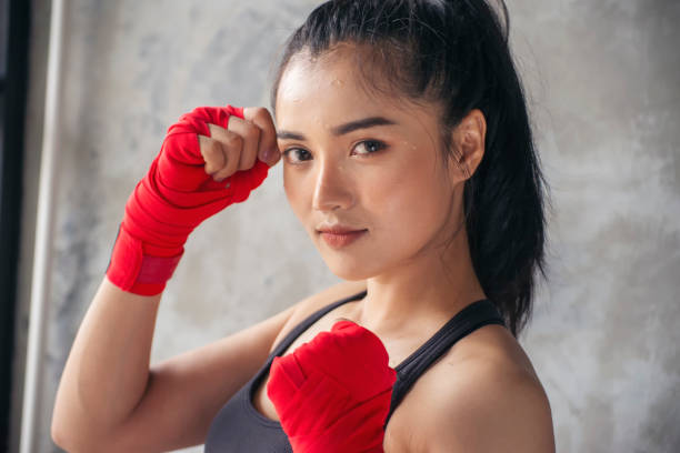 istock Muay Thai woman and Healthy concept. 1205449248