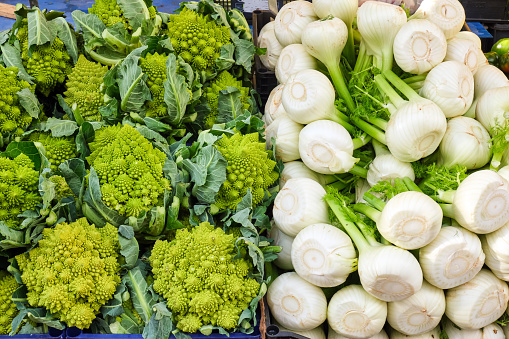 Romanesco broccoli and fennel for sale a a market