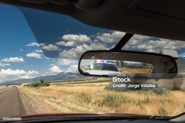 Police Pulling Over Vehicle On The Streets Stock Photo - Download Image Now - Stop - Single Word, Traffic, Police Force